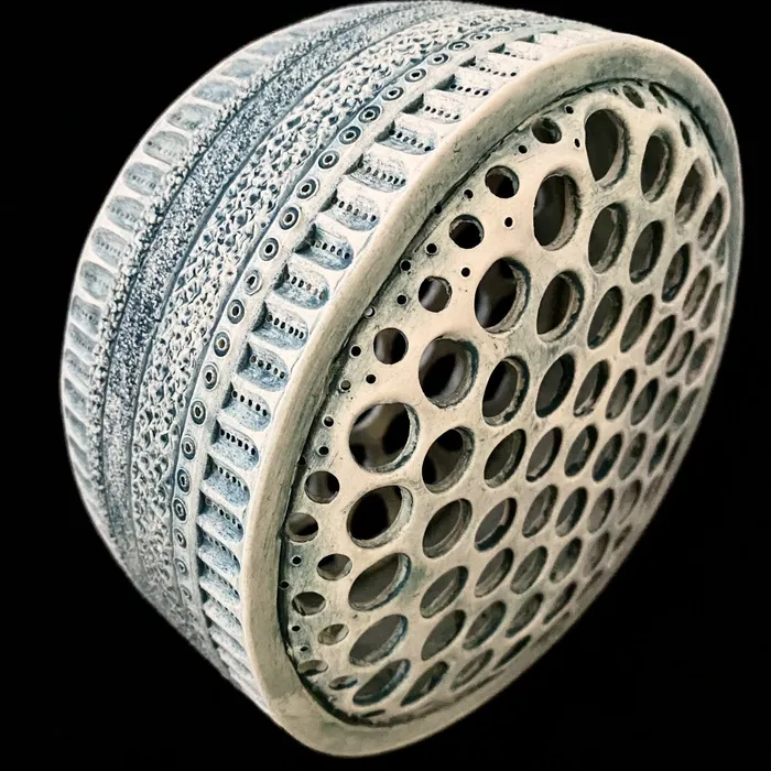 Centric Diatom pierced sculpture, sea green