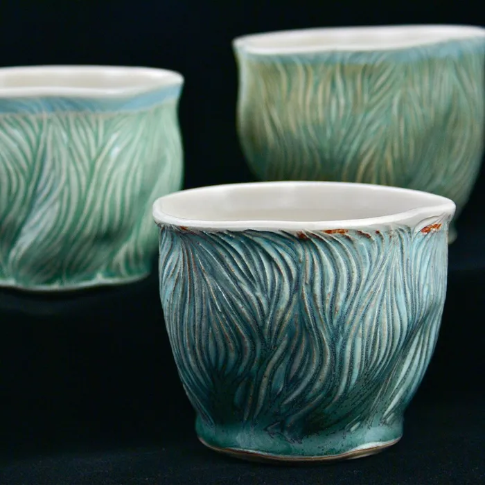 Carved cups